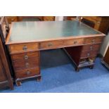 A Victorian mahogany twin pedestal partners desk, the rectangular top green leather inset above an