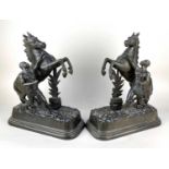 A pair of metal models of Marley horses 41cm high (a/f)