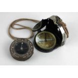 A US Army Corps of Engineers military compass and an Original Bezard compass