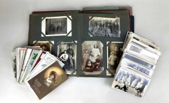 A collection of early 20th century and later photographs, postcards and greetings cards, some