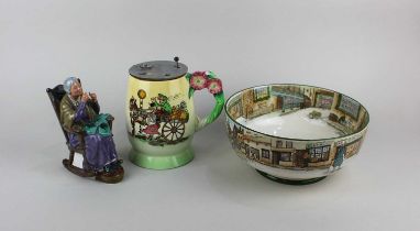 A Royal Doulton Dickens ware ceramic fruit bowl 22.5cm diameter, a Royal Doulton figure 'A stitch in