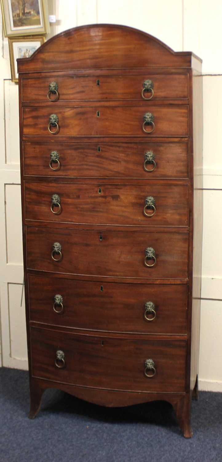 A 19th century mahogany bowfront chest of seven graduated drawers with brass lion mask ring - Image 2 of 2