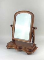 A Victorian mahogany framed dressing table mirror on shaped platform base 48cm high