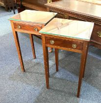 A pair of mahogany bedside tables with square tops and single drawer with drop ring handles, on