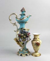 A 19th century porcelain flask and stopper, probably Derby, with floral encrusted decoration on