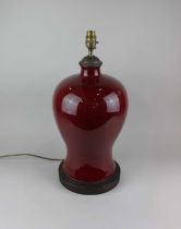 LOT WITHDRAWN A sang de beouf glazed porcelain vase converted to a table lamp