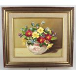 Pamela Davis, floral still life with primroses, 'May Posy', oil on board, signed, 19cm by 24cm, with