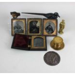 Four daguerreotypes depicting three ladies and a gentleman, a Christ's Hospital cloak badge with