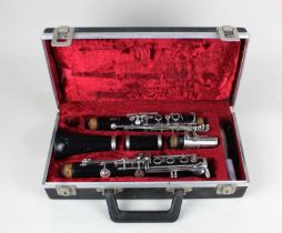 A Regent clarinet in fitted case (a/f)
