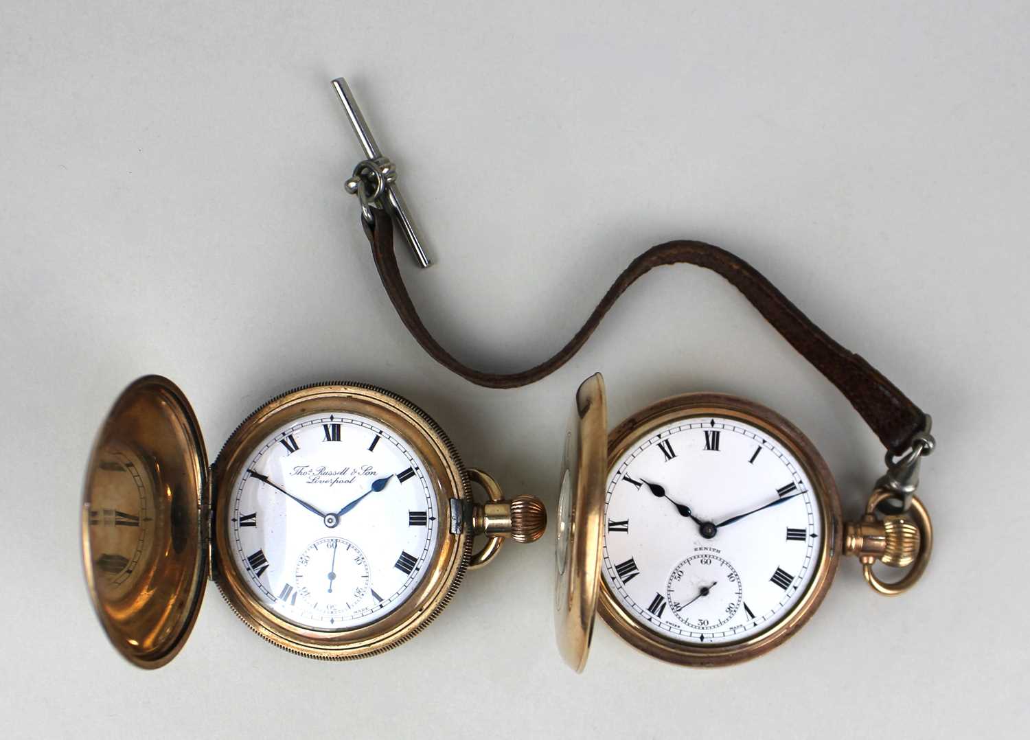 A Zenith gilt metal half hunter pocket watch, presentation engraving to inner case dated 1930, and a