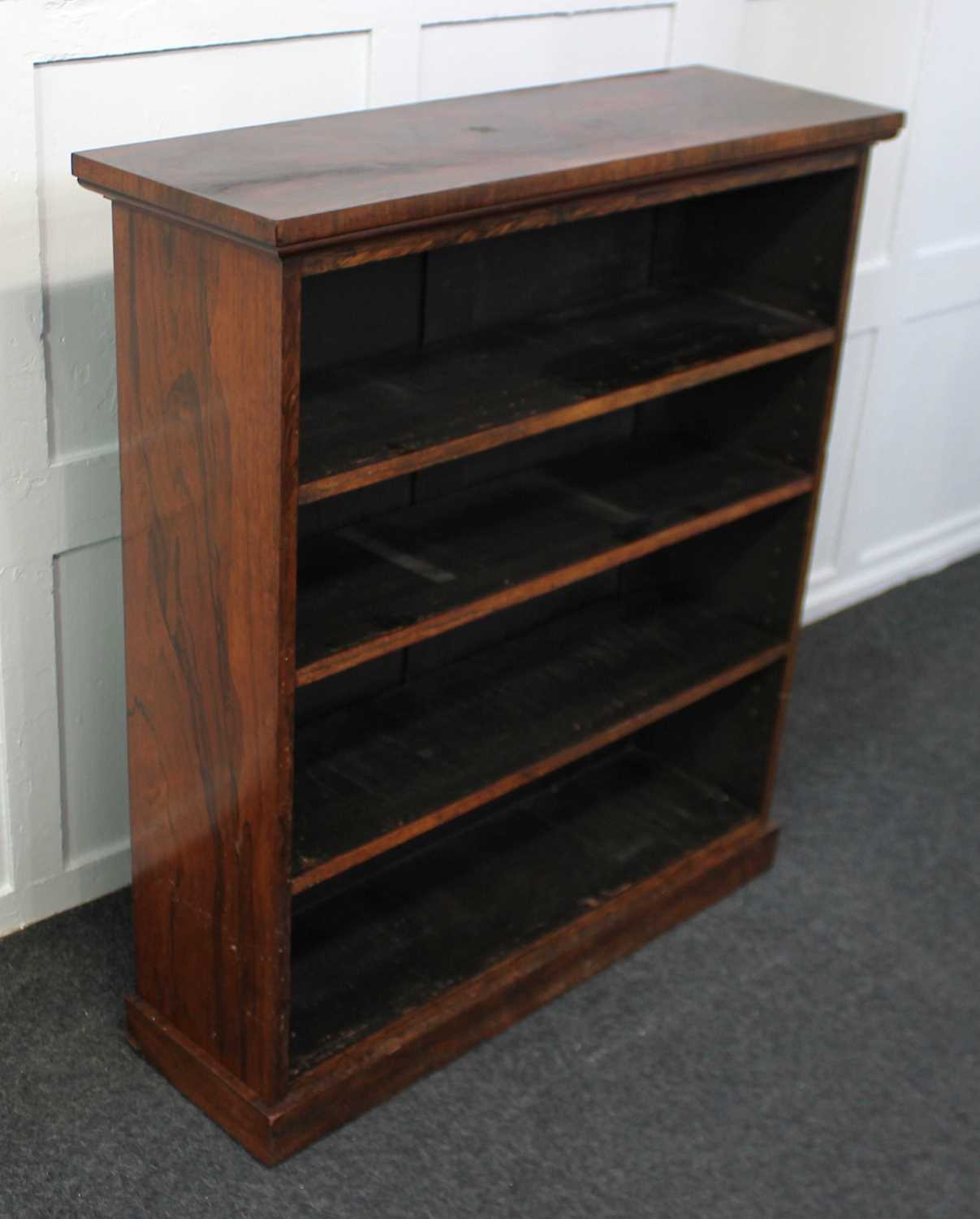 A 19th century rosewood open bookcase with three adjustable shelves, on plinth base, 90cm