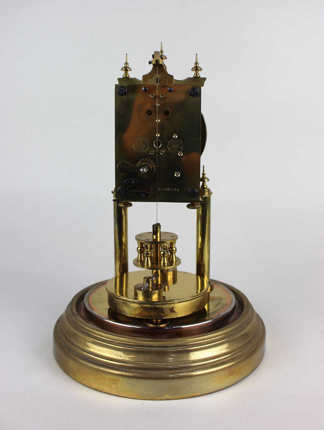 A gilt metal anniversary mantle clock under a glass dome on circular base, 29cm - Image 4 of 6