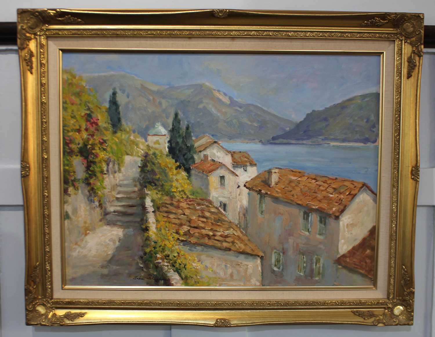 John Stephen (b 1926), Swiss lake side view, 'Lake Lugano', oil on board, signed, verso inscribed,