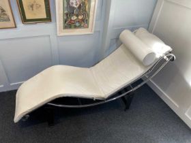 A Modernist style LC4 Chaise Longue after the iconic design by Le Corbusier, in cream leather on