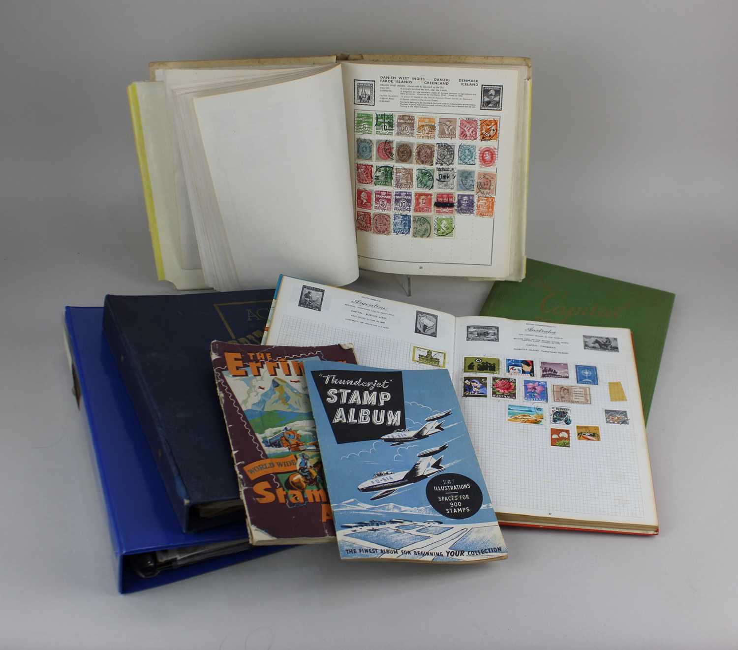 Seven albums and files of British and World stamps to include The Universal Stamp Album and The