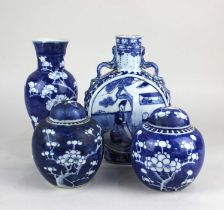 A 19th century Chinese blue and white ceramic moonflask, with twin dragon handles, painted with