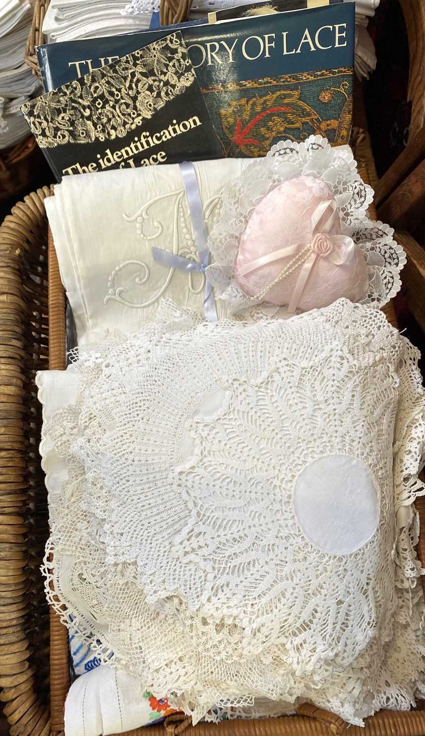 A large collection of antique and vintage lace, crochet, damask, embroidery, and other linens,