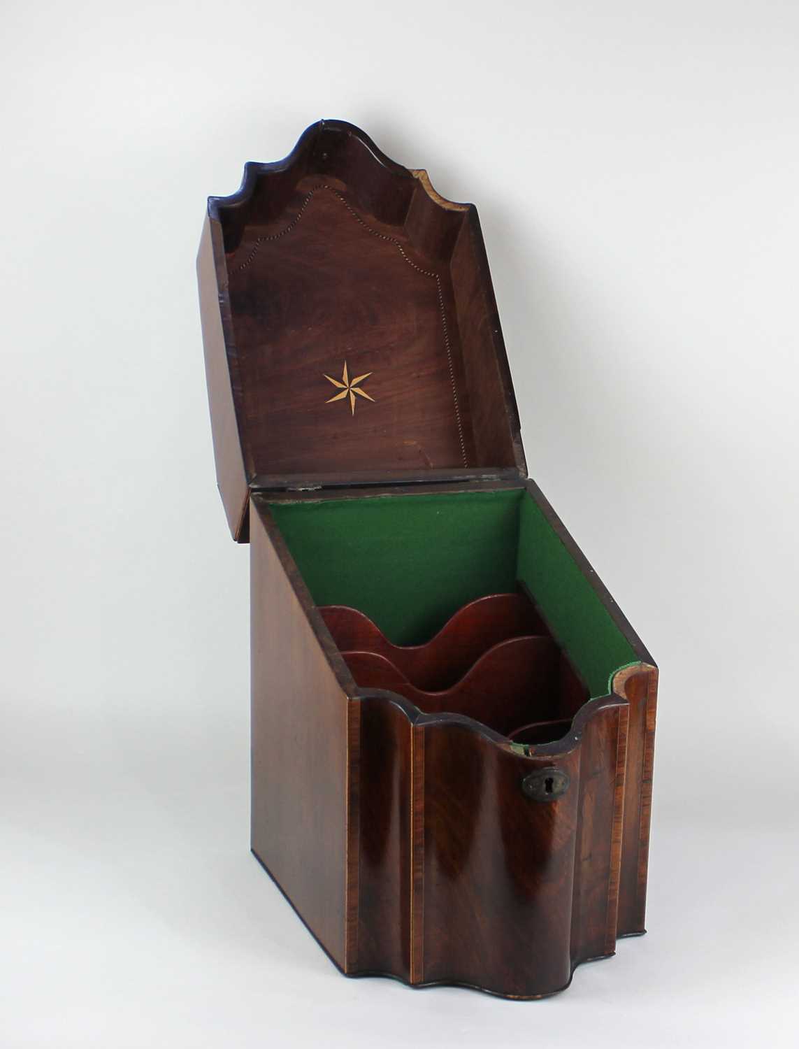 A George III mahogany knife box, of serpentine form, with crossbanded hinged lid, the interior later - Image 2 of 2