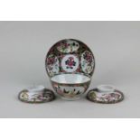 A Chinese famille rose porcelain bowl and cover on stand, character marks to base, with extra