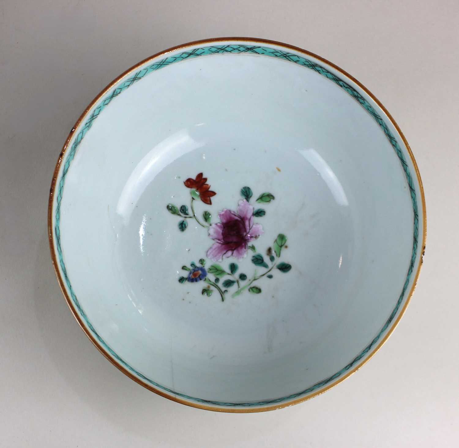 A Chinese porcelain bowl with floral decoration, green decorative border to rim 19cm diameter (a/f) - Image 2 of 2