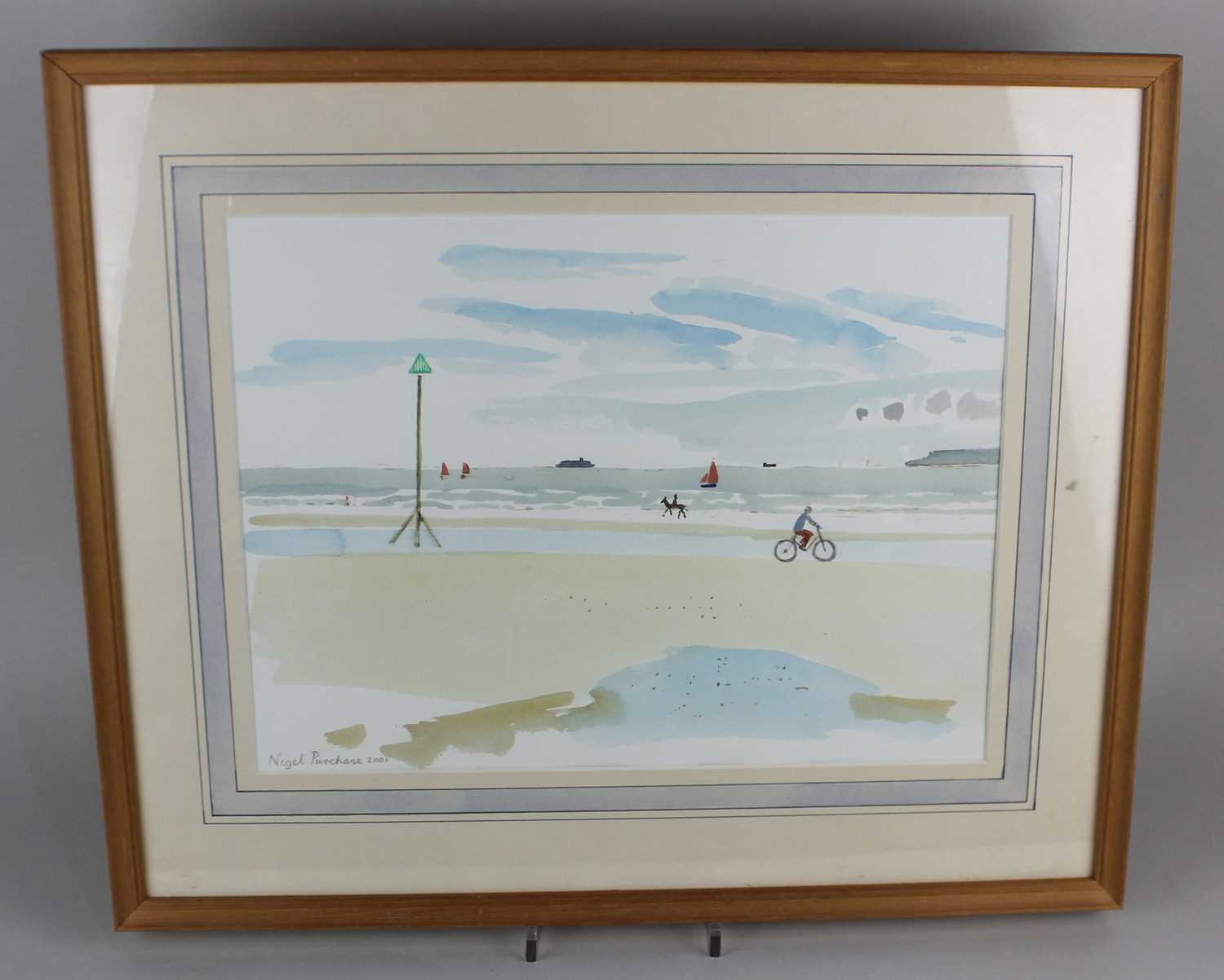 Local interest, Nigel Purchase, beach scene with figure on a bicycle and distant boats, watercolour,