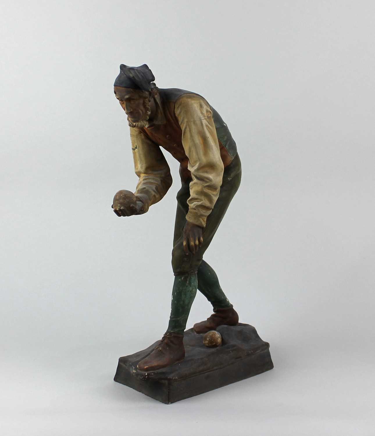 A late 19th century Austrian figure of a bowler after August Kuhne 38.5cm high