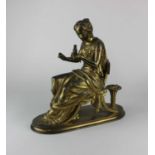 After Antoine-Pierre Aubert (1853 -1912), a gilt metal figure of a woman mending a fishing net