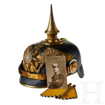 A helmet for Prussian One Year Guard Infantry volunteers, with shoulder boards and photo of owner