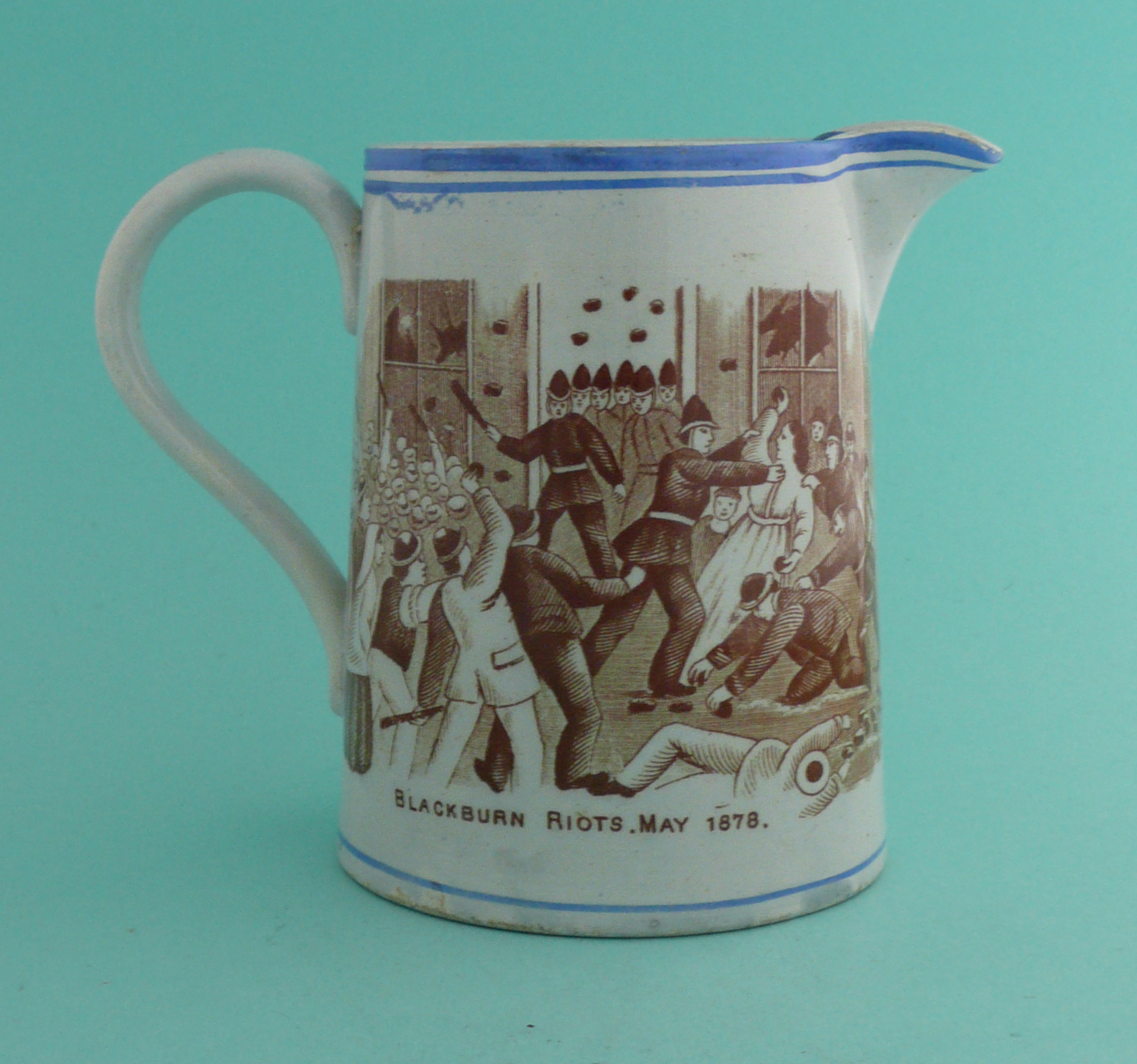 1878 Blackburn Riots: a good and very rare pottery jug lined in blue and printed in brown, - Image 2 of 4