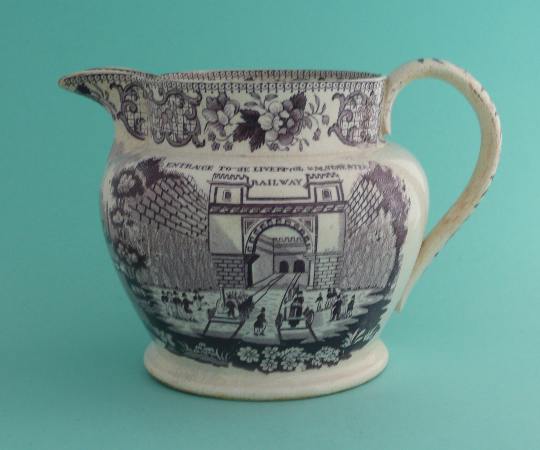 Liverpool and Manchester Railway: a pottery jug printed in purple with a view of the entrance and on