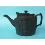 Wellington: a black basalt teapot and cover moulded with an equestrian portrait and on the reverse