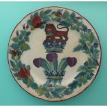 Prince Regent: an earthenware plate printed in green and enamelled in colours with feathers