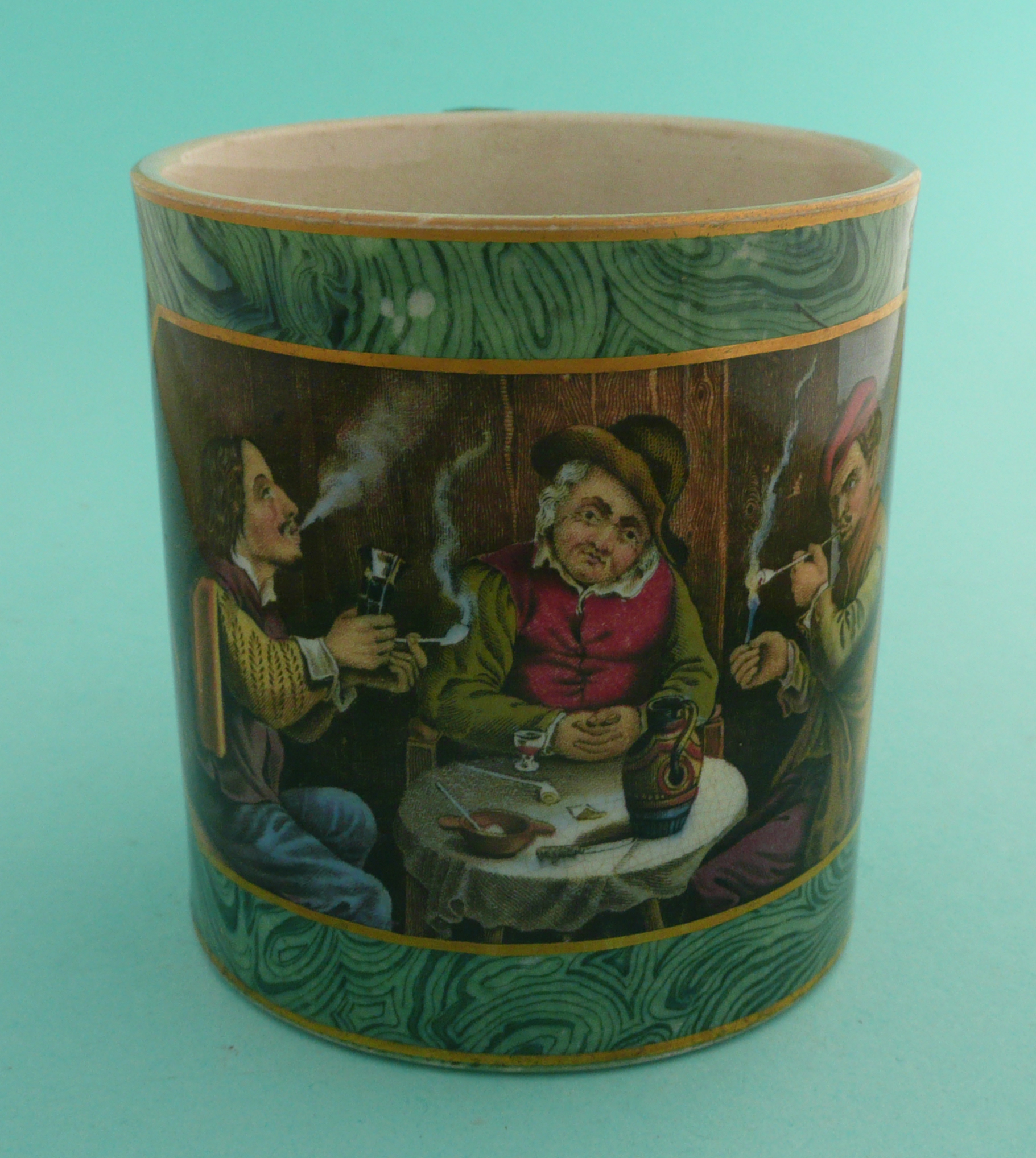 A good small malachite ground mug; The Smokers (405) 87mm. (potlid, pot lid, Prattware,