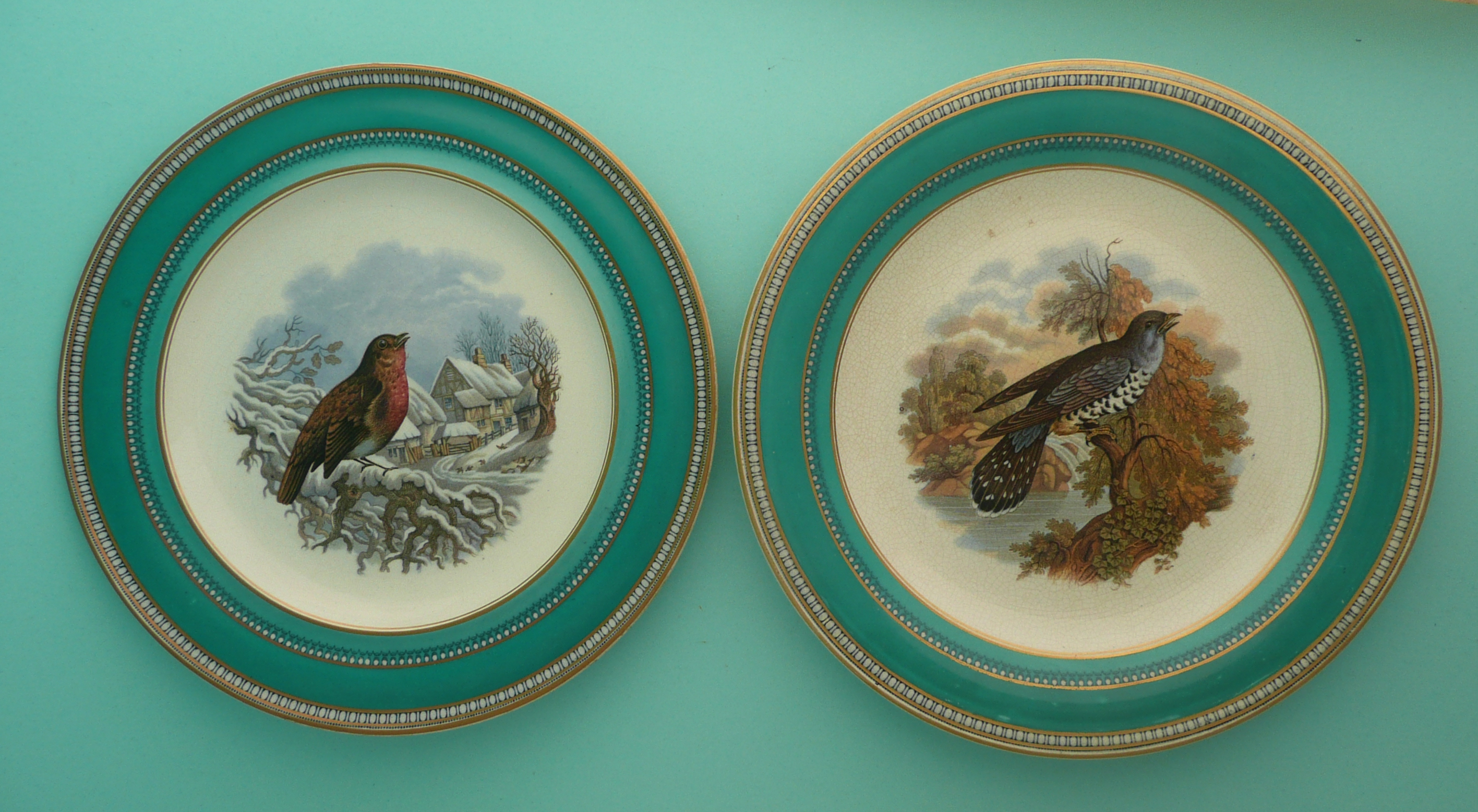 A good dessert plate: The Robin (278) and another The Cuckoo (281) both green ground (2). (potlid,