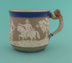 1813 Battle of Vittoria: a salt glazed mug, the buff-coloured body banded in blue and applied in