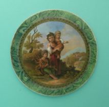 A circular malachite ground plaque: The Cottage Children (313). (potlid, pot lid, Prattware,