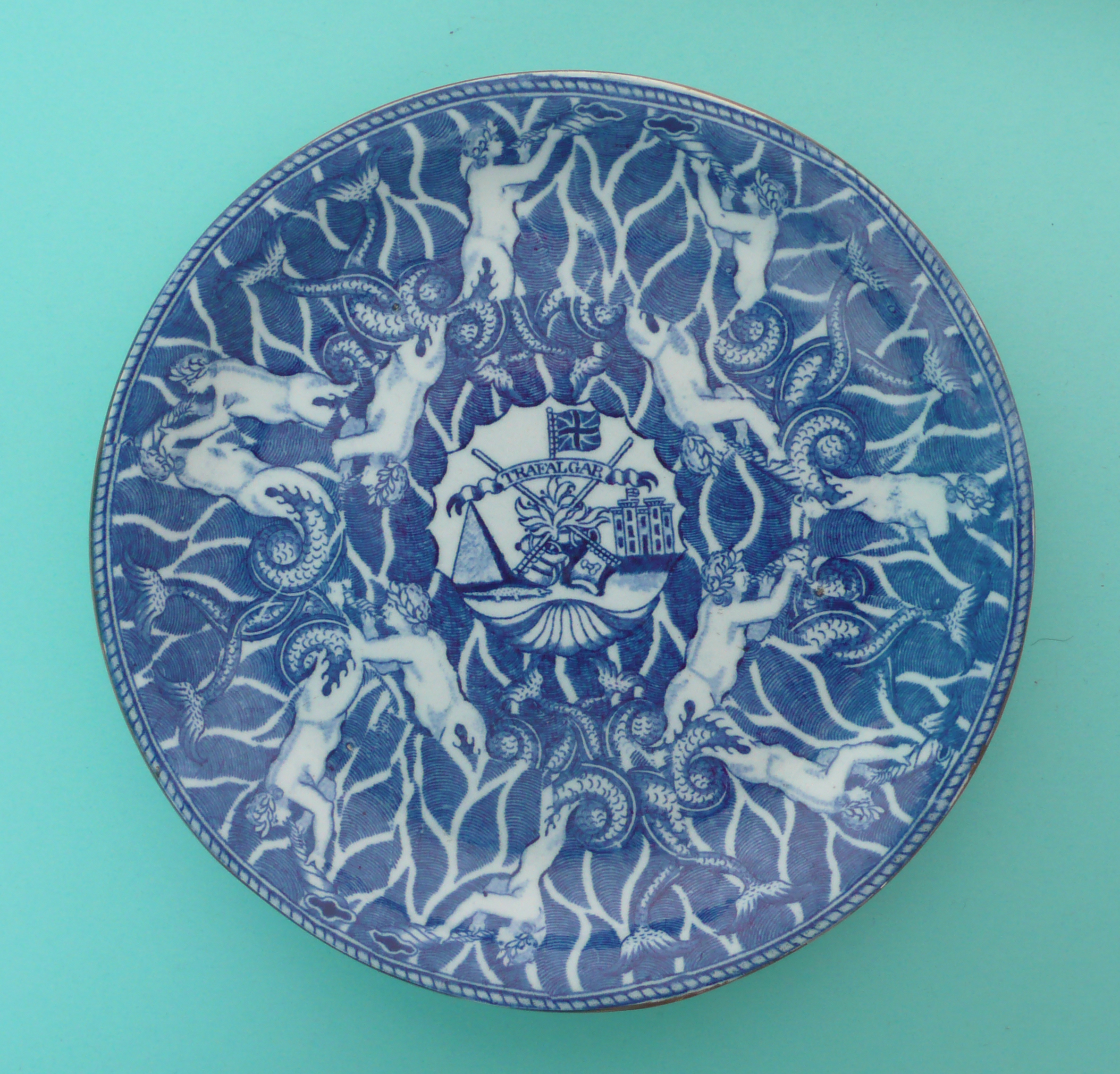 1805 Nelson and Trafalgar: a good pearlware saucer dush printed with an all over design of sea