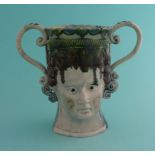 George III and Queen Charlotte: a Prattware dry loving cup modelled as maskheads impressed with