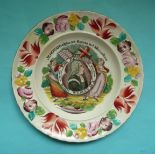 Rev John Wesley: a colourful nursery plate with moulded border centred by a silhouette medallion,