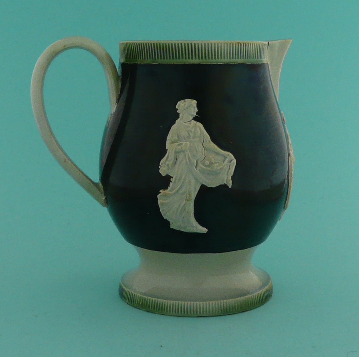 Admiral Rodney: a green glazed earthenware jug, the black ground applied in white with a named - Image 2 of 5