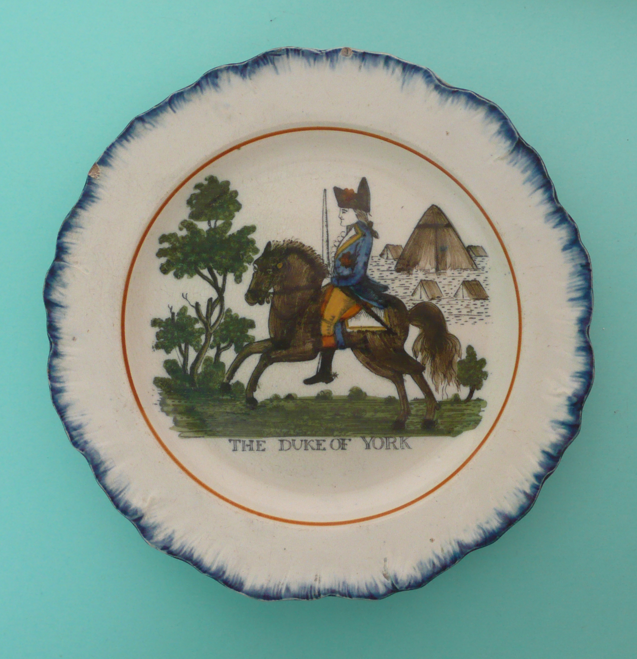 The Duke of York: a good Prattware blue feather edged plate painted in colours with a named