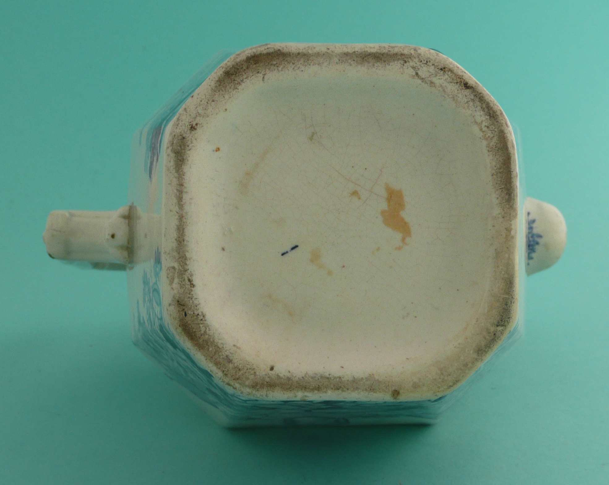 Victoria: a pottery jug with maskhead spout, the octagonal body printed in blue with a named - Image 4 of 4