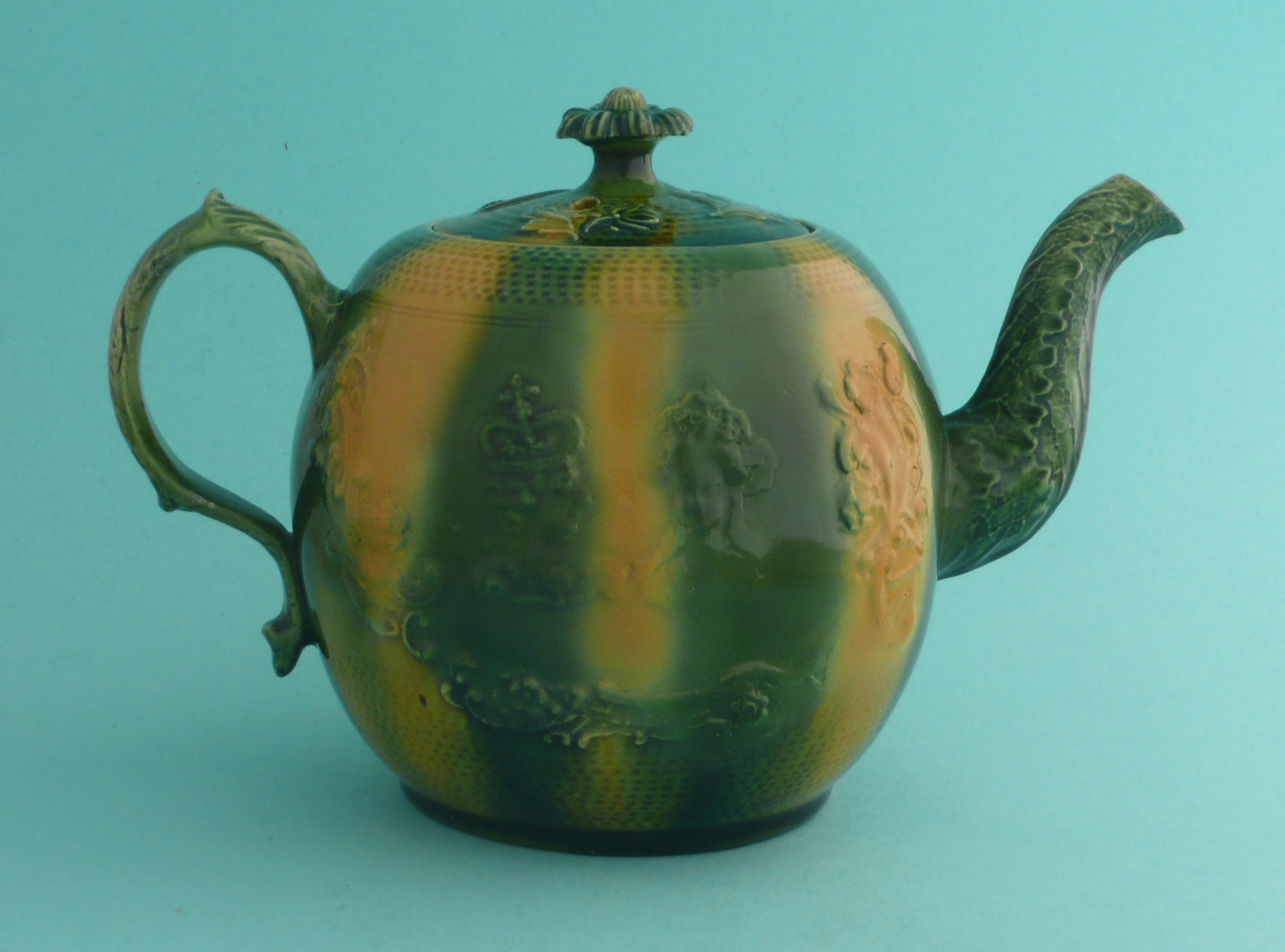 George III and Queen Charlotte: a Whieldon type teapot and cover with floral knop, moulded with - Image 2 of 6