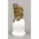 Chimpanzee on a bell-shaped pedestal, Fraureuth, Saxony, 1920s, designed by Oskar Pflug in 1922,