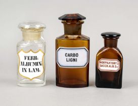 3 apothecary standing vessels, 1 x clear glass, 1 x brown glass, 1 x brown glass rare morphine