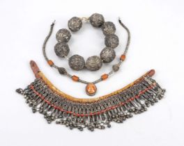 3 necklaces, North Africa 19th/20th century, textile, sub-alloyed silver, stones...differently