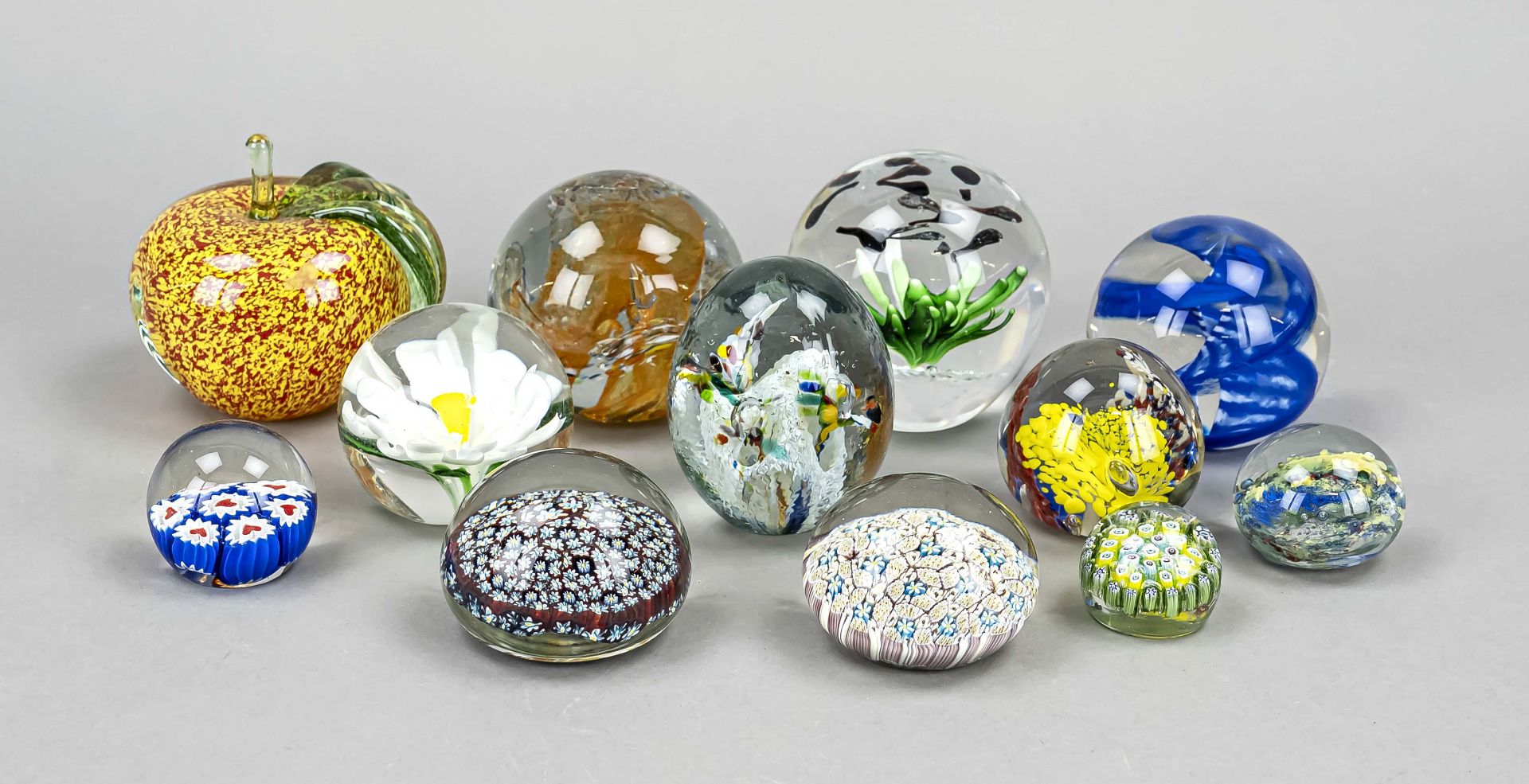 Mixed lot of twelve paperweights, 2nd half 20th century, predominantly round, 1x in apple shape,