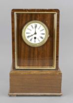 Polished mahogany table clock, partly cracked, 1st half 20th century, around the dial with gilded