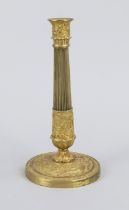 Empire-style candlestick, 19th century, gilt bronze/brass. Profiled and relief-ornamented base,