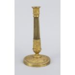 Empire-style candlestick, 19th century, gilt bronze/brass. Profiled and relief-ornamented base,